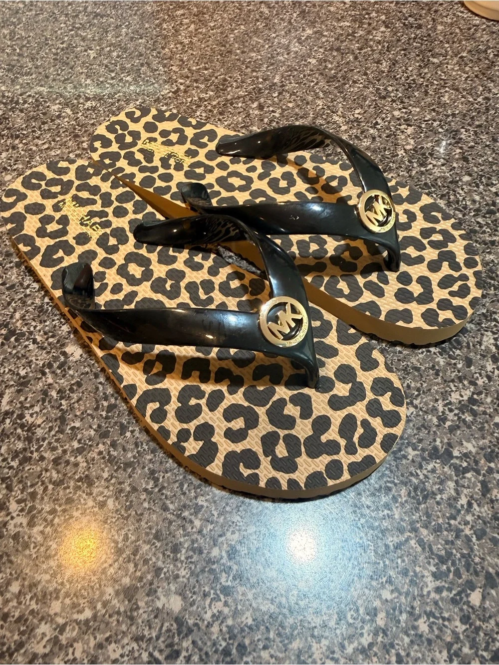 Michael Kors leopard print flip flops